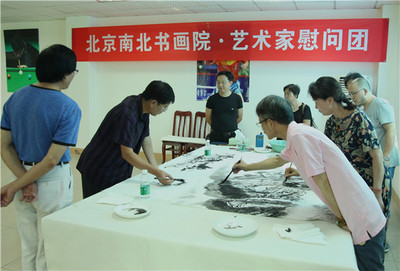 翰墨傳情暖警營 藝術(shù)交流勵(lì)紅妝——北京南北書畫院藝術(shù)家赴四川女子特警隊(duì)開展慰問交流活動